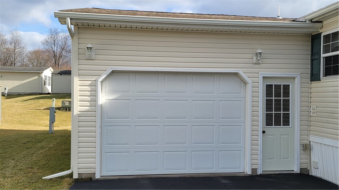 6301 Lambert Street Victor, NY 14564 - Photo 7 of 31 Attached Garage: It is 1 1/2 Car Wide by 2 car len