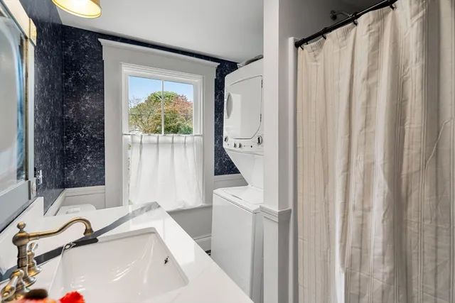 a bathroom with a sink and a bathtub