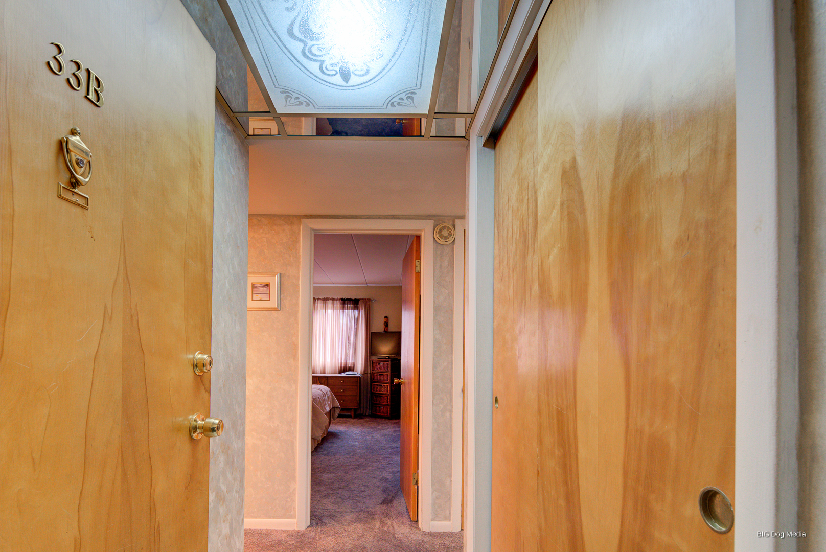 940 Holbrook Road, Unit 33B Homewood, IL 60430 - Photo 12 of 24 a view of a hallway with wooden floor and a bathroom