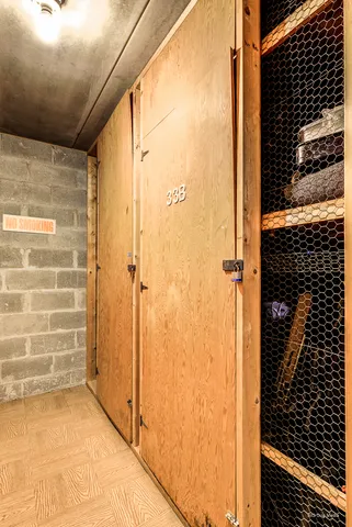 a room with a sink and a washer dryer