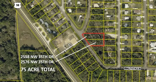 a view of a door with a street sign on a wall