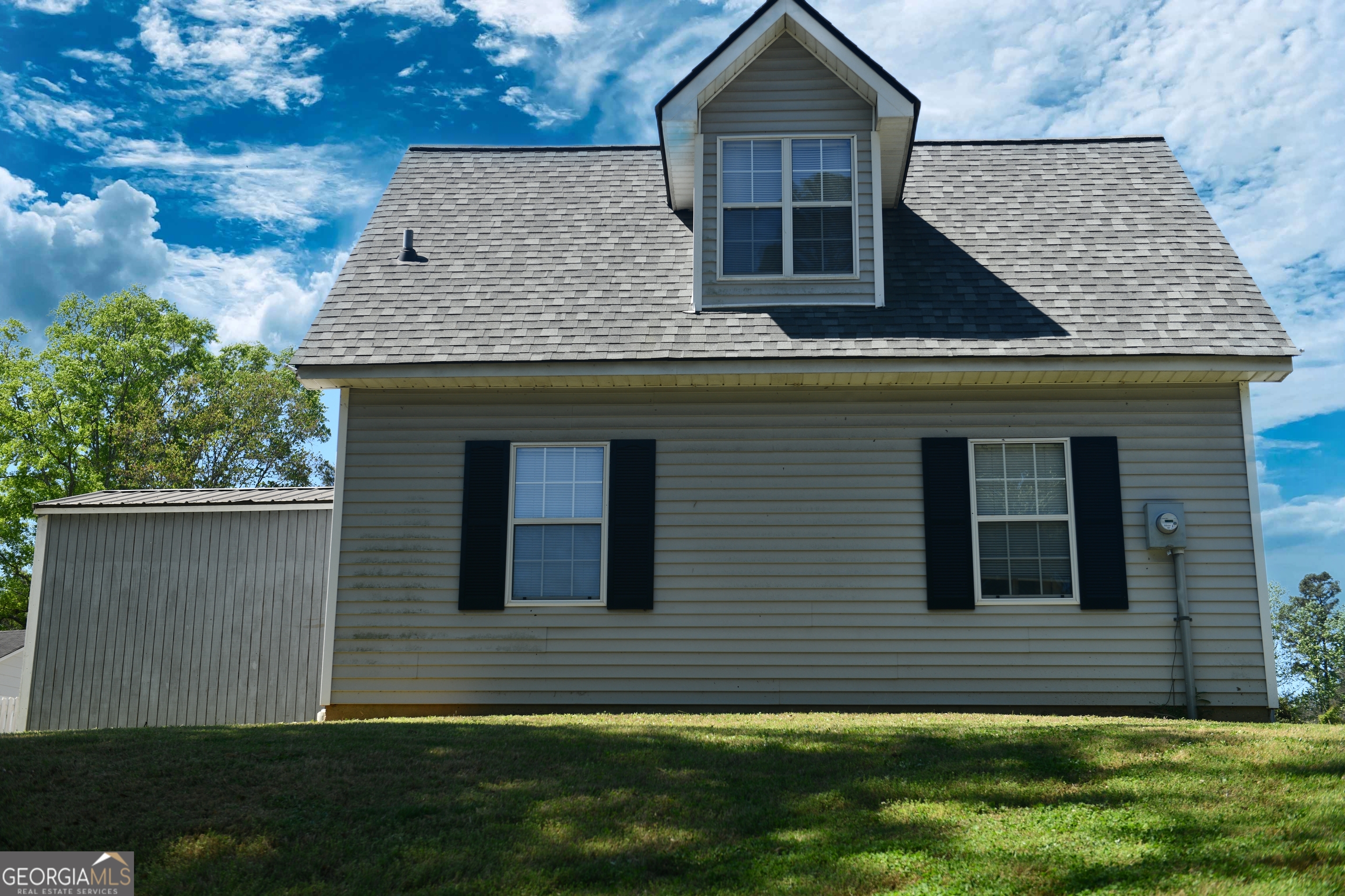 108 Sweetgum Road Peachtree City, GA 30269 - Photo 5 of 6 a view of front of house with a yard