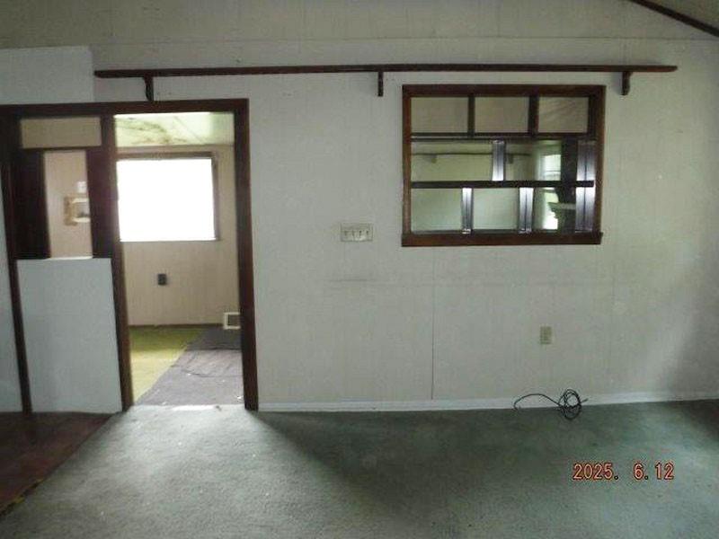 822 Robin Road Saltsburg, PA 15681 - Photo 2 of 8 a view of an empty room with a window