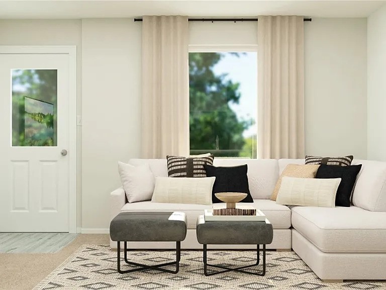 520 Commander Abbott Drive Jarrell, TX 76537 - Photo 3 of 10 a living room with furniture and a large window