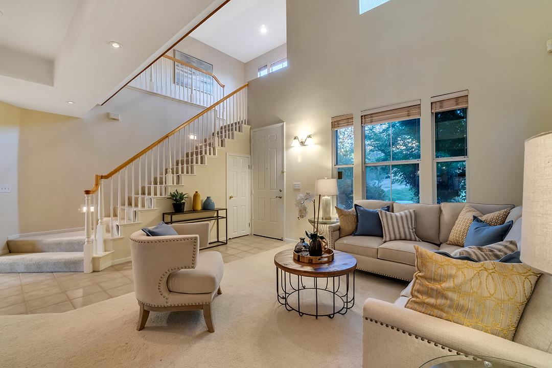 906 Schoolhouse Road San Jose, CA 95138 - Photo 20 of 57 a living room with furniture and a large window