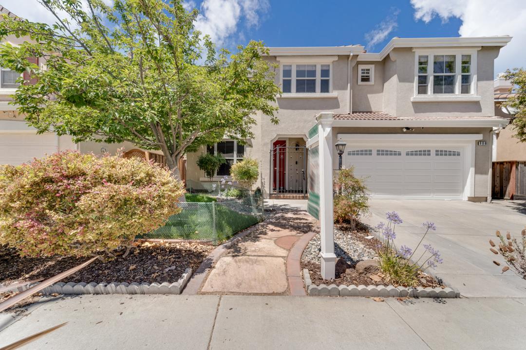 906 Schoolhouse Road San Jose, CA 95138 - Photo 2 of 57 a front view of a house with a yard