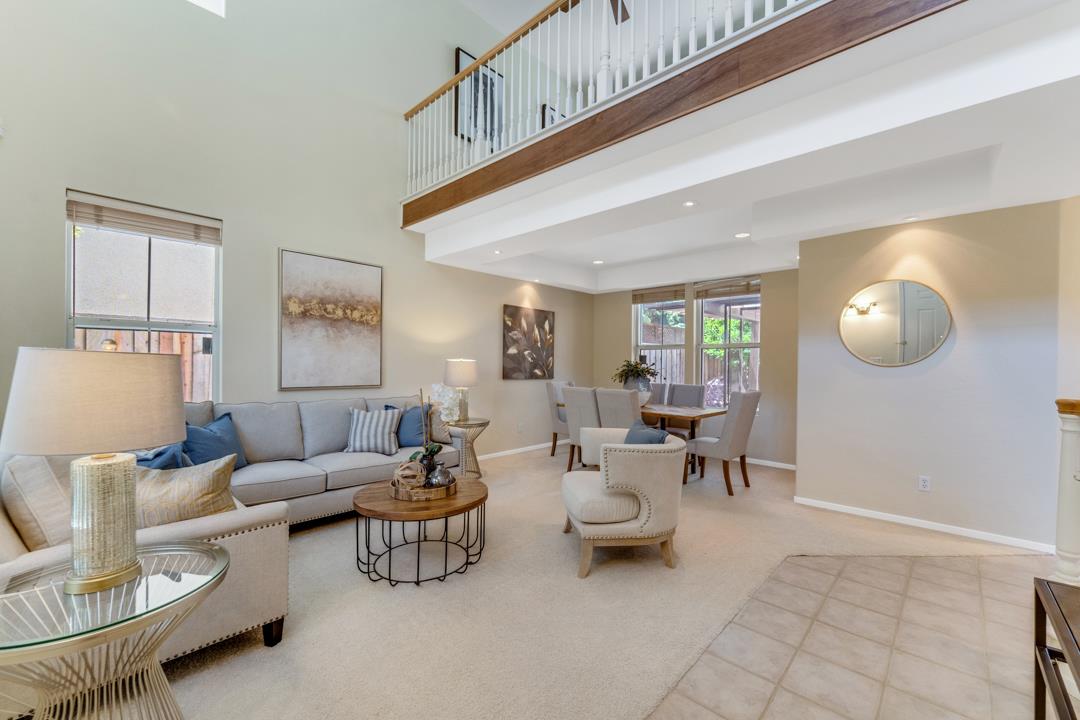 906 Schoolhouse Road San Jose, CA 95138 - Photo 3 of 57 a living room with furniture and wooden floor