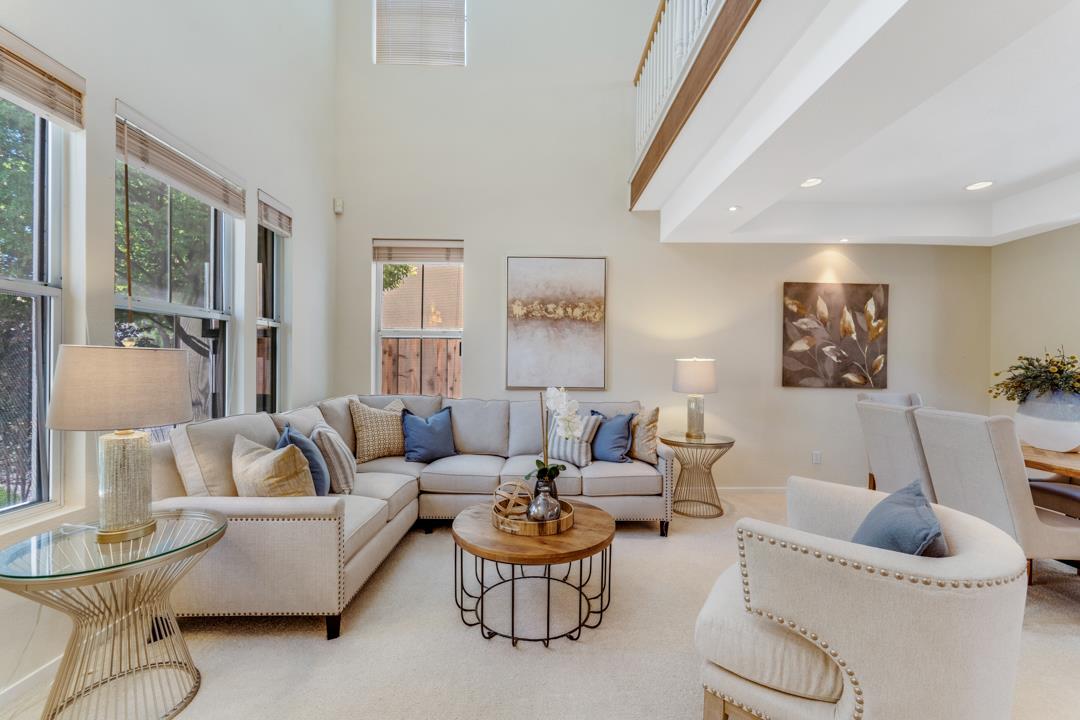 906 Schoolhouse Road San Jose, CA 95138 - Photo 4 of 57 a living room with furniture and a large window