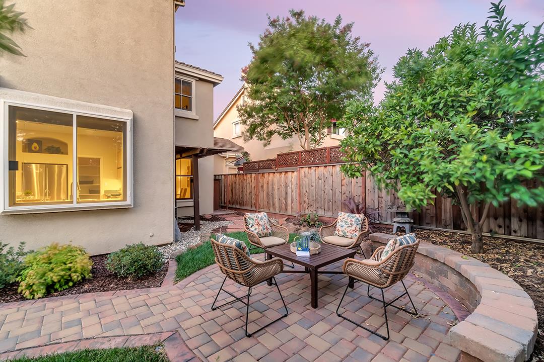 906 Schoolhouse Road San Jose, CA 95138 - Photo 46 of 57 a backyard of a house with outdoor seating