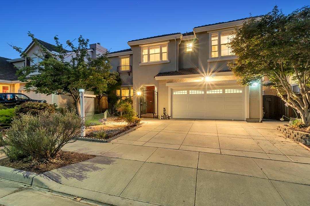 906 Schoolhouse Road San Jose, CA 95138 - Photo 50 of 57 a view of a house with a yard and potted plants