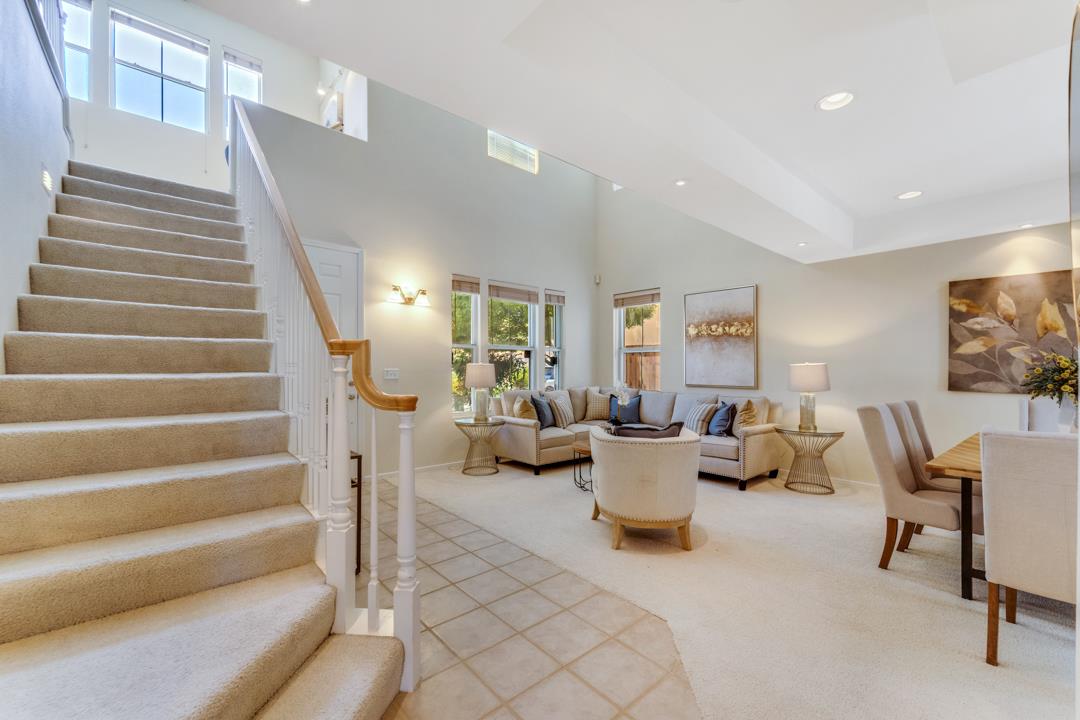 906 Schoolhouse Road San Jose, CA 95138 - Photo 5 of 57 a living room with furniture and stairs