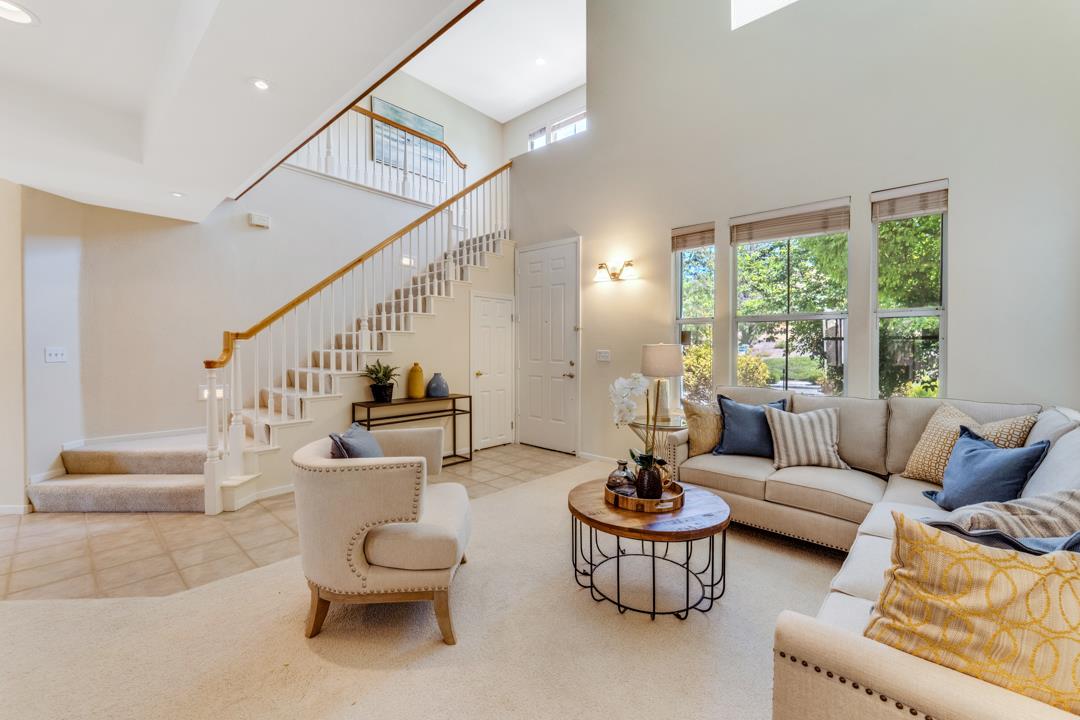 906 Schoolhouse Road San Jose, CA 95138 - Photo 9 of 57 a living room with furniture and a large window