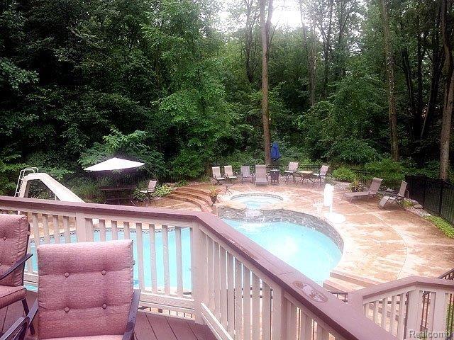 5595 Kirkridge Trail Rochester, MI 48306 - Photo 22 of 24 Pool View From Kitchen