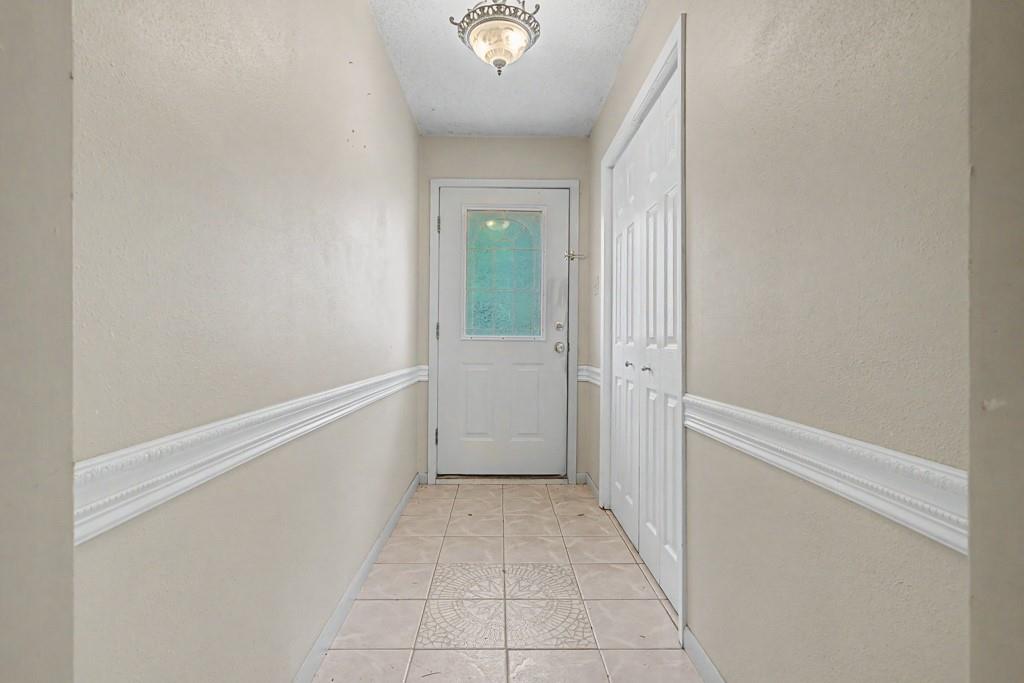 2104 Wainwright Court Longview, TX 75605 - Photo 12 of 31 a view of a hallway with closet