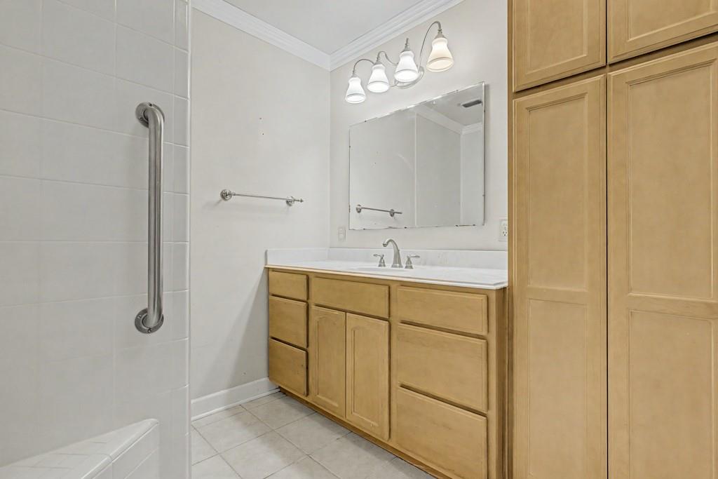 2104 Wainwright Court Longview, TX 75605 - Photo 5 of 31 a bathroom with a sink and a mirror