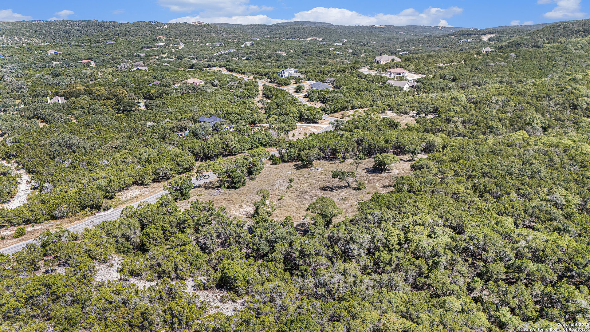 355 PR 1709 Mico, TX 78056 - Photo 18 of 18 a view of a city with green field