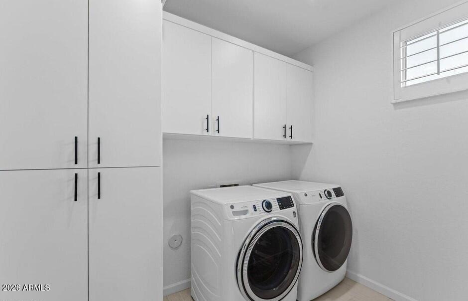 4540 Jackpot Road Wickenburg, AZ 85390 - Photo 10 of 13 a view of storage and utility room with washer and dryer