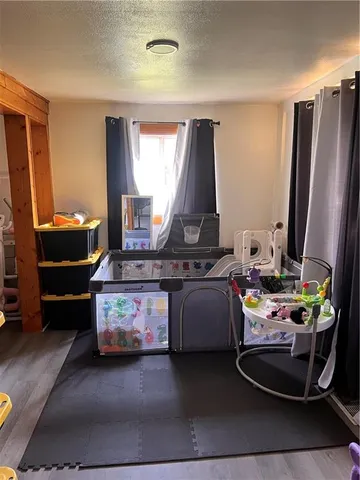 a room with furniture and window