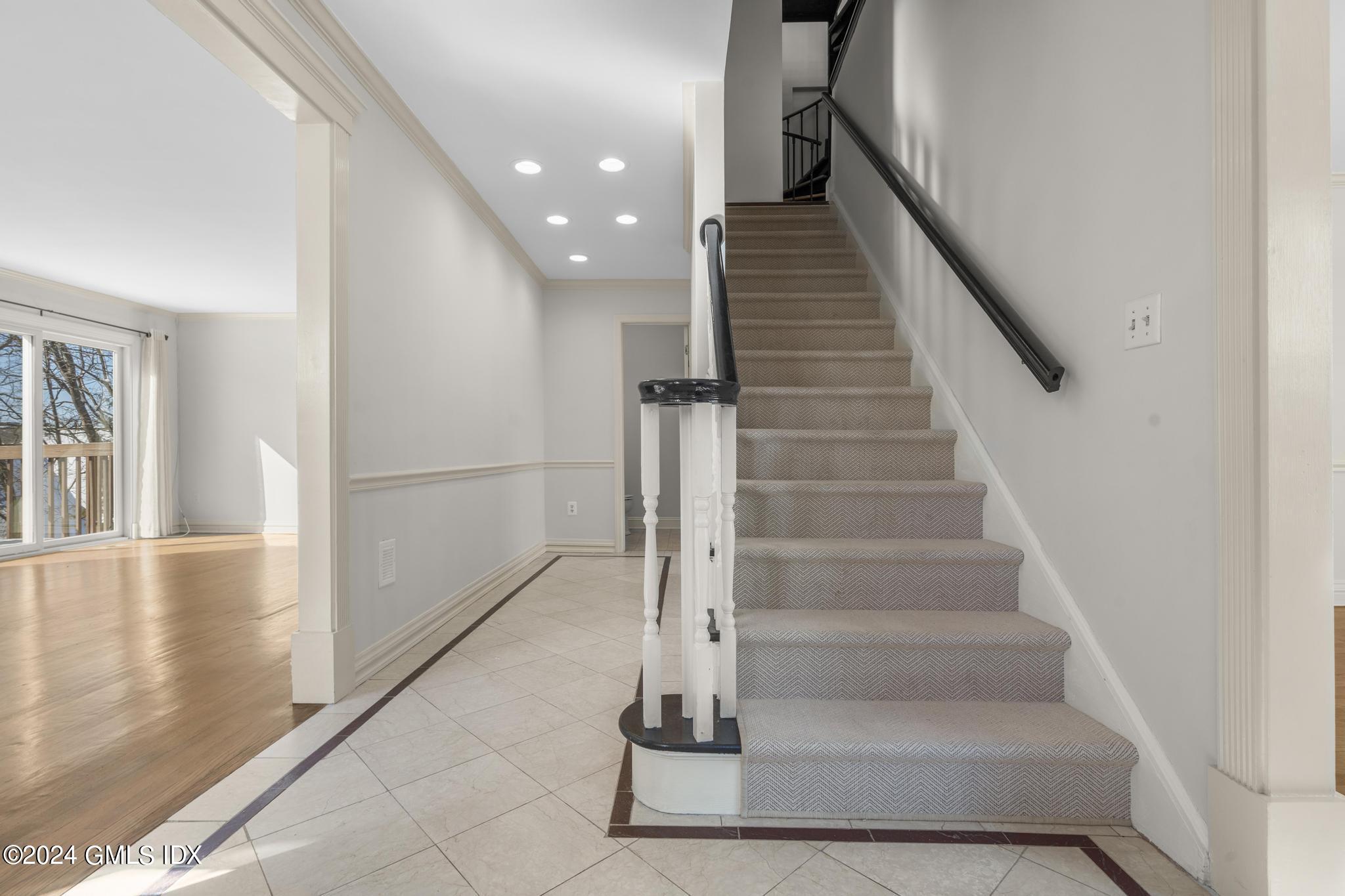 172 Field Point Road, Unit 1 Greenwich, CT 06830 - Photo 3 of 36 a view of entryway and hall