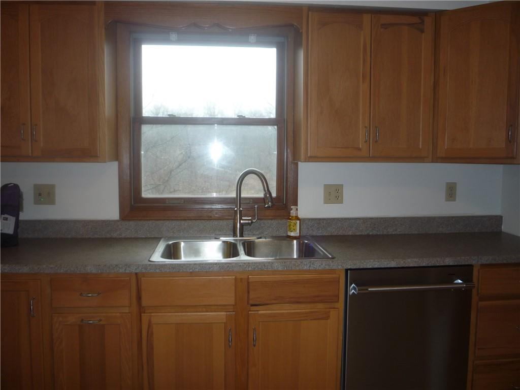 4465 Mt Troy Rd Extension, Unit 2 Pittsburgh, PA 15214 - Photo 12 of 36 a kitchen with a sink and a window