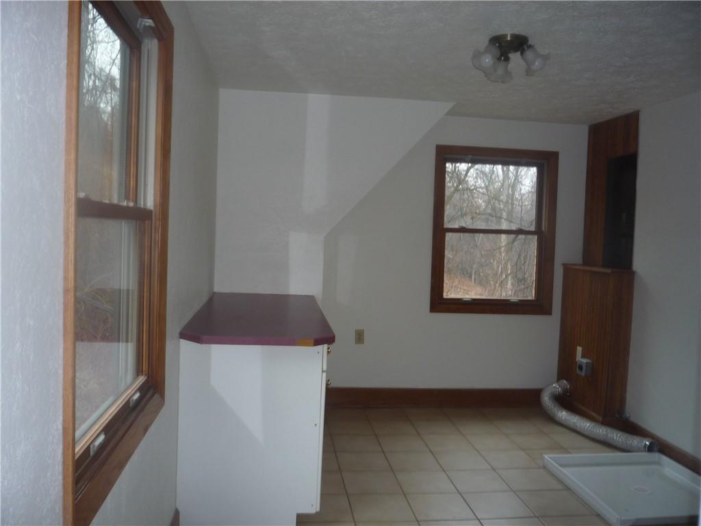 4465 Mt Troy Rd Extension, Unit 2 Pittsburgh, PA 15214 - Photo 27 of 36 a view of an empty room with a window