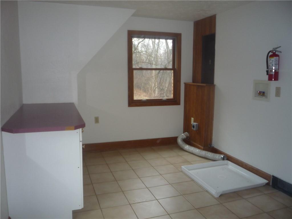 4465 Mt Troy Rd Extension, Unit 2 Pittsburgh, PA 15214 - Photo 29 of 36 an empty room with windows