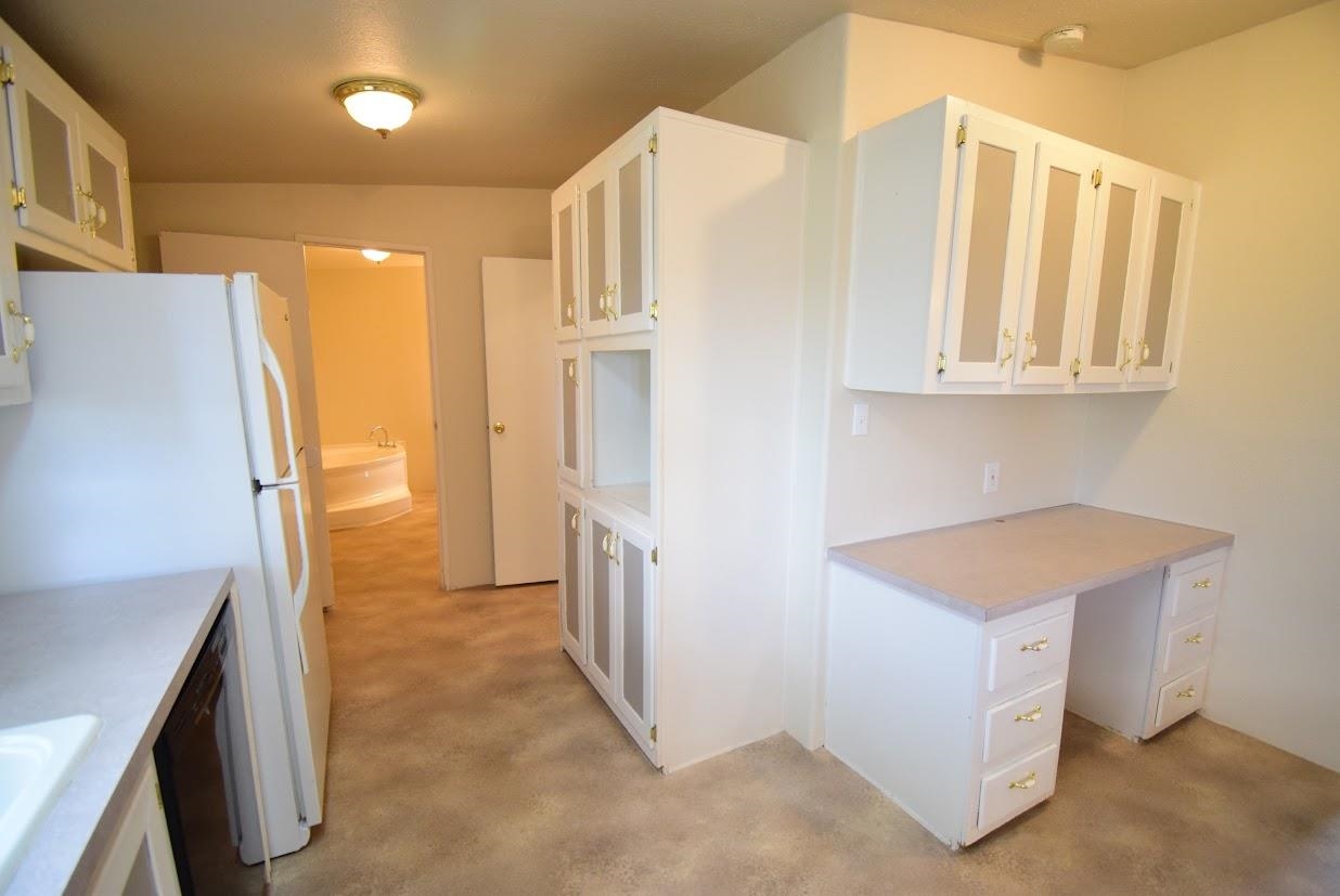 19548 B50 Road Delta, CO 81416 - Photo 5 of 37 a view of entryway with cabinets and a window