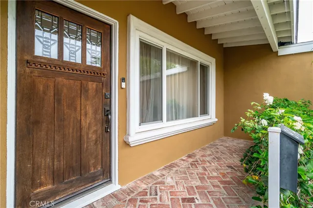 a front view of a house with a porch