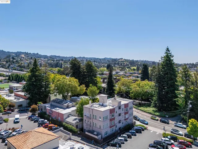 a view of a terrace with a garden and deck