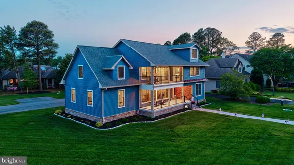 an aerial view of a house with a garden