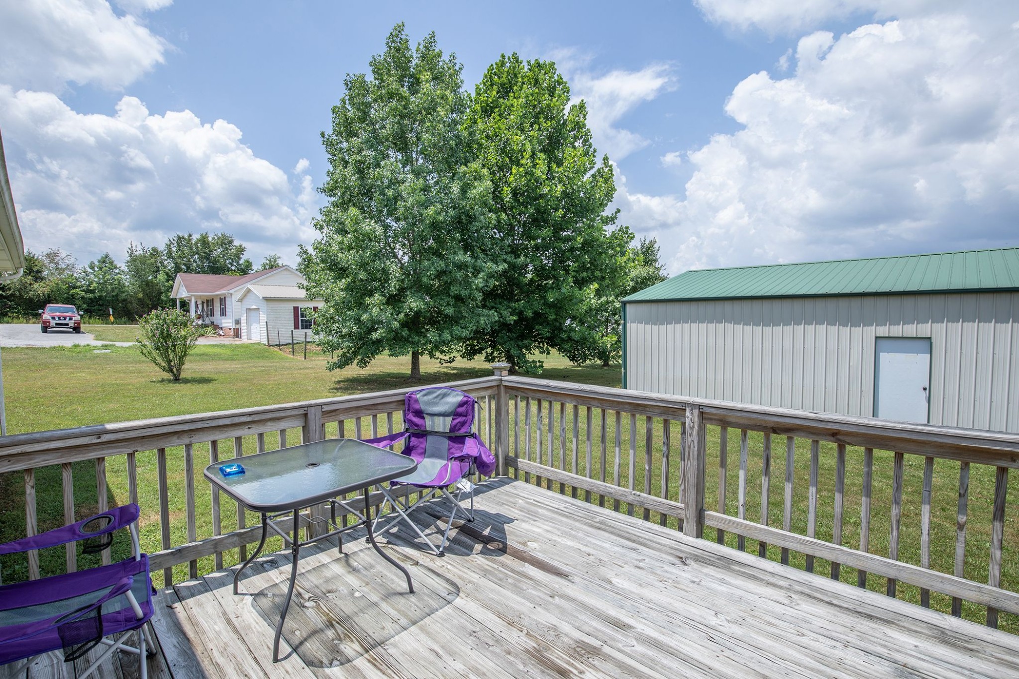 207 Hester Road Portland, TN 37148 - Photo 11 of 41 a view of a deck with wooden floor and furniture