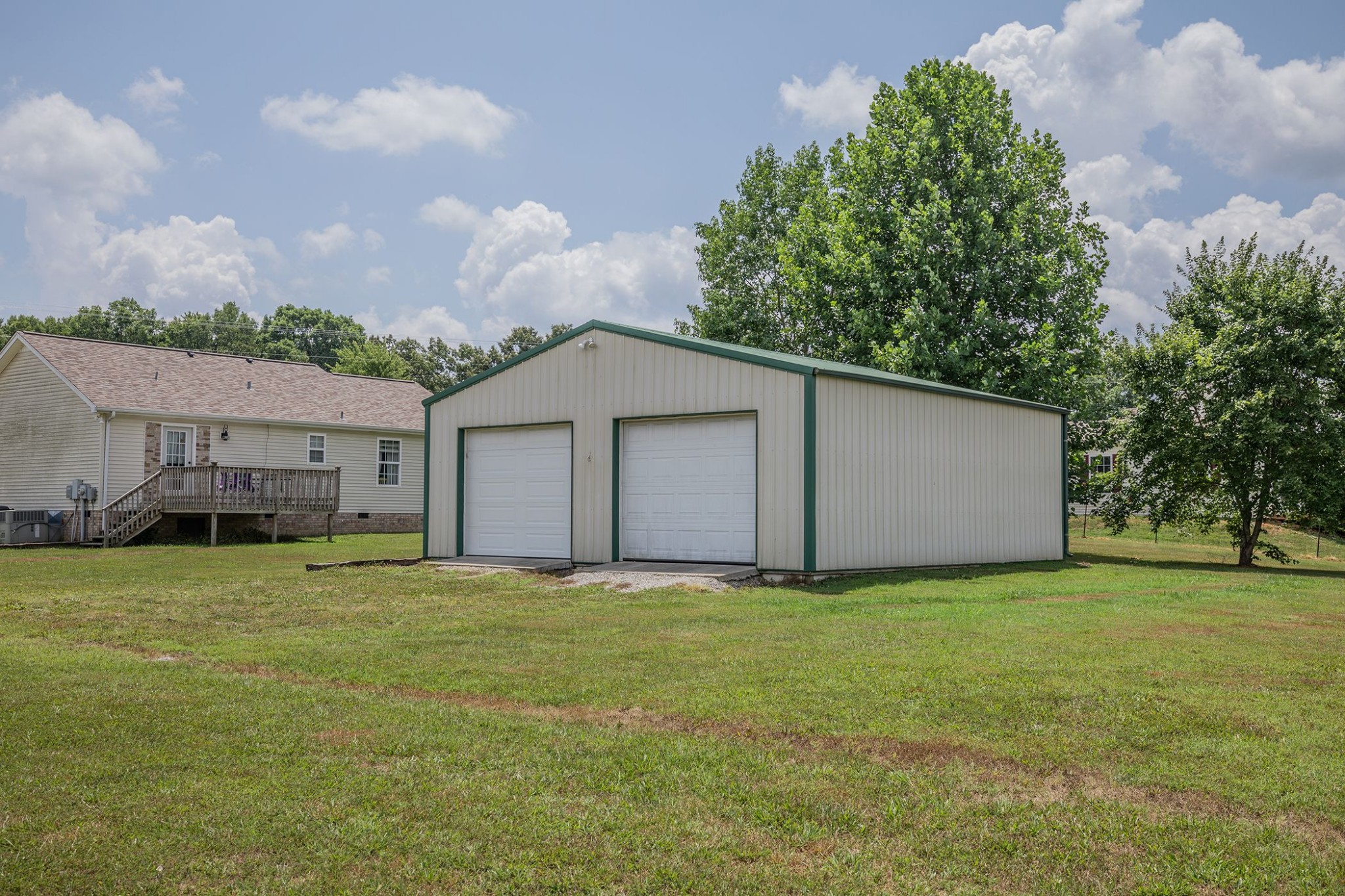 207 Hester Road Portland, TN 37148 - Photo 17 of 41 a big house with a big yard and large trees