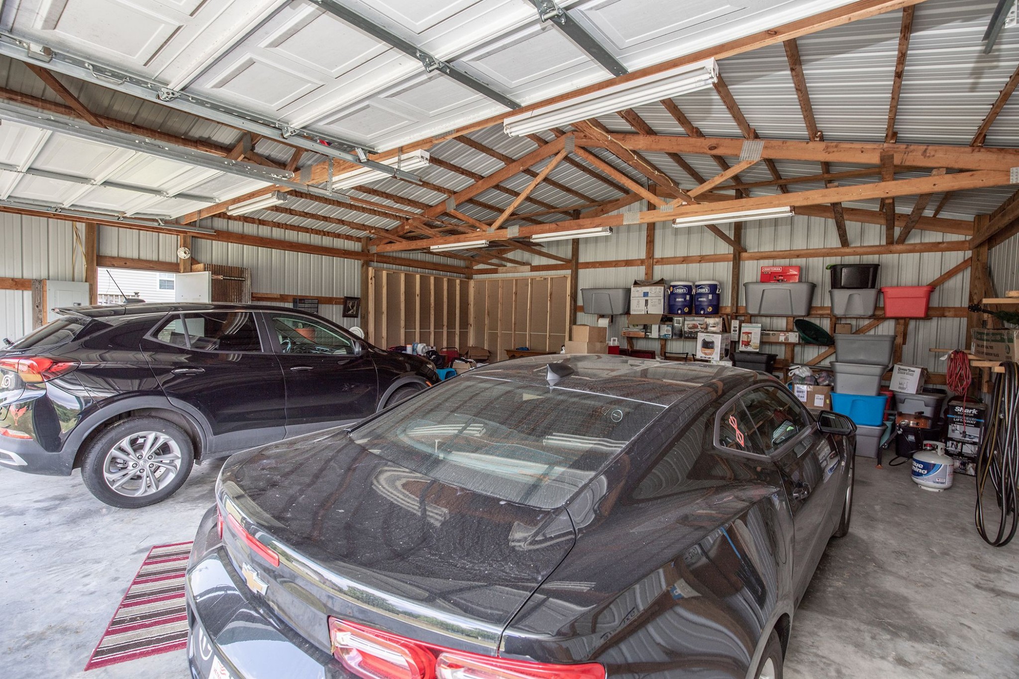 207 Hester Road Portland, TN 37148 - Photo 21 of 41 a view of parking garage with cars