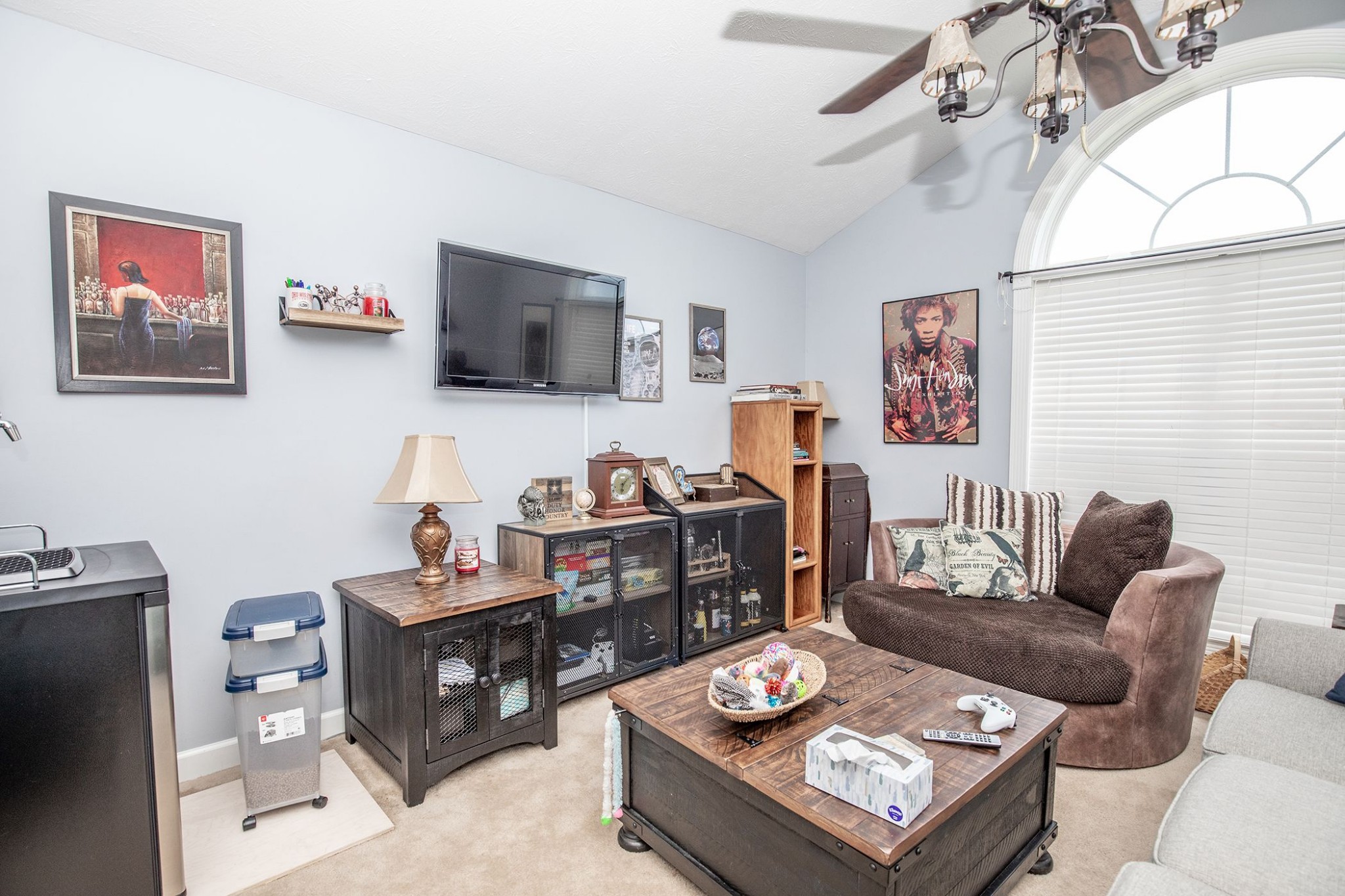 207 Hester Road Portland, TN 37148 - Photo 28 of 41 a living room with furniture a flat screen tv and a window