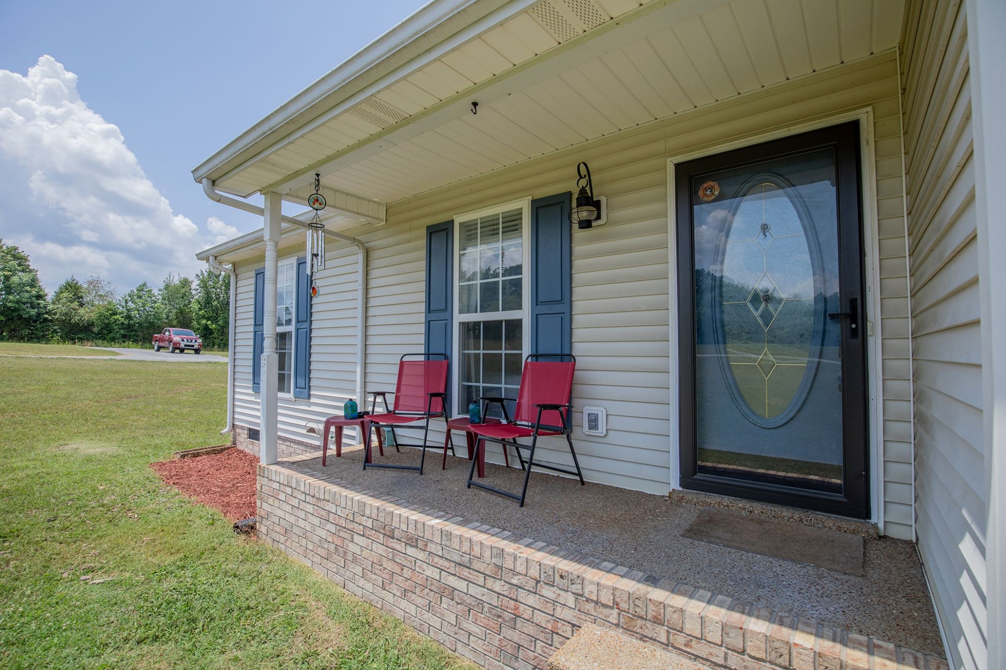 207 Hester Road Portland, TN 37148 - Photo 6 of 41 a view of a two chairs in the patio
