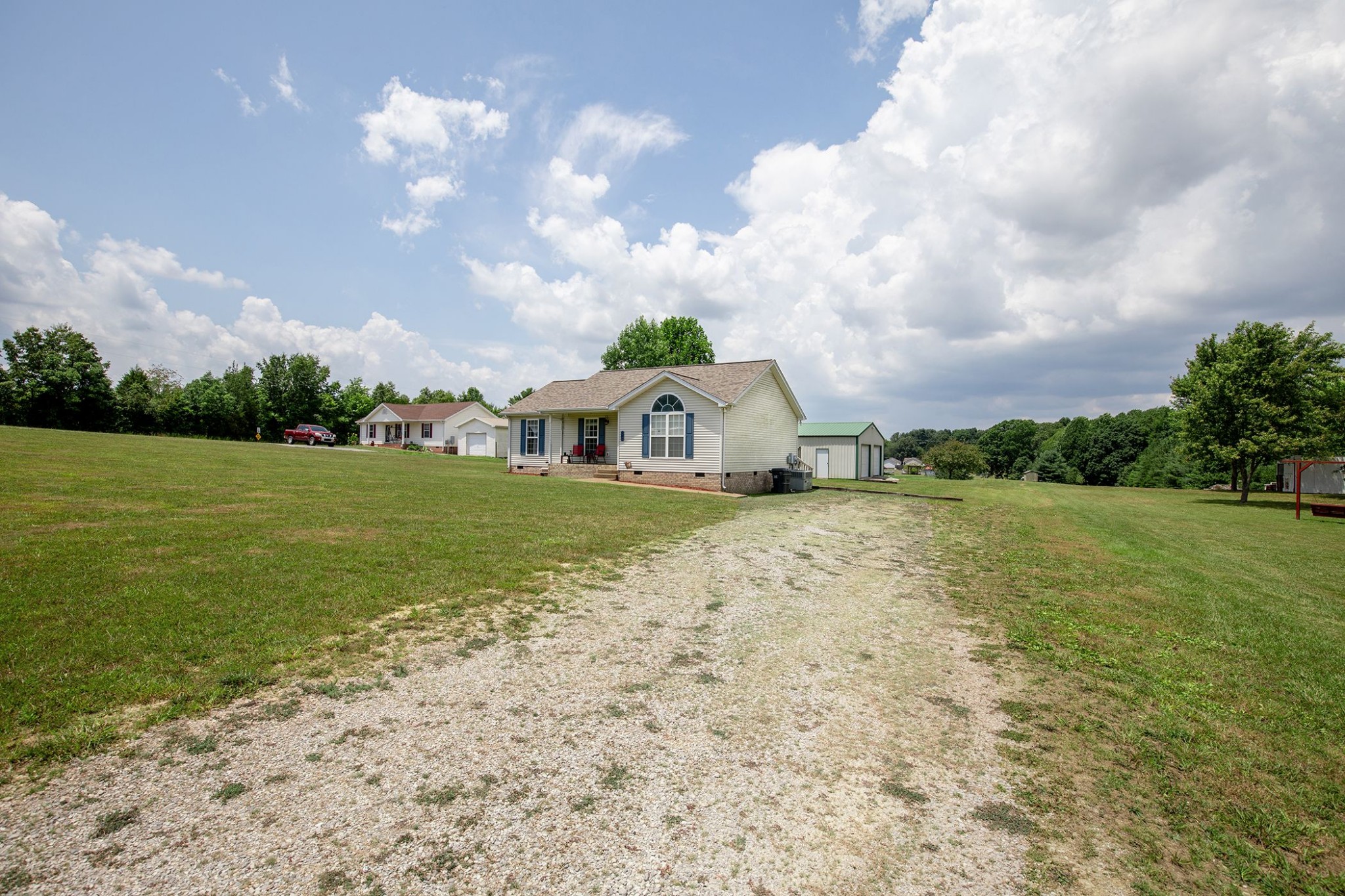 207 Hester Road Portland, TN 37148 - Photo 7 of 41 a house view with swimming pool in front of it