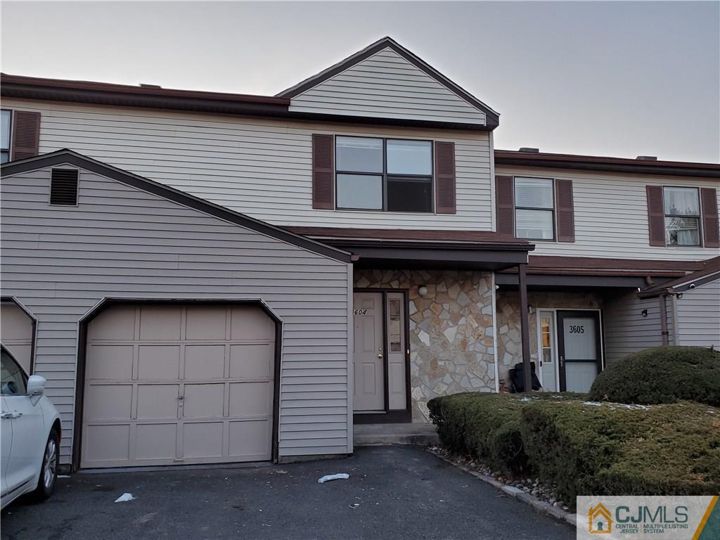 3604 Hana Road Edison, NJ 08817 - Photo 1 of 15 a front view of a house with a garage