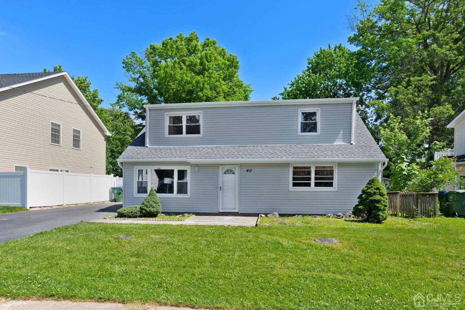 40 Markham Road Edison, NJ 08817 - Photo 1 of 2 a view of outdoor space yard and front view of a house