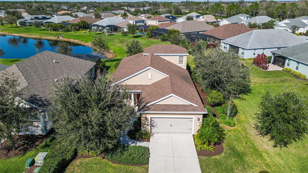 an aerial view of a house with a garden