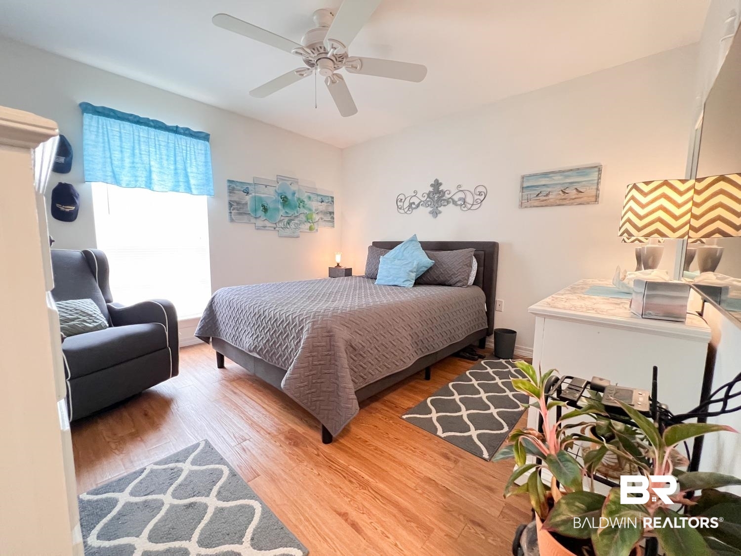 16690 Plum Court Loxley, AL 36551 - Photo 13 of 30 Bedroom with ceiling fan and light wood-type flooring