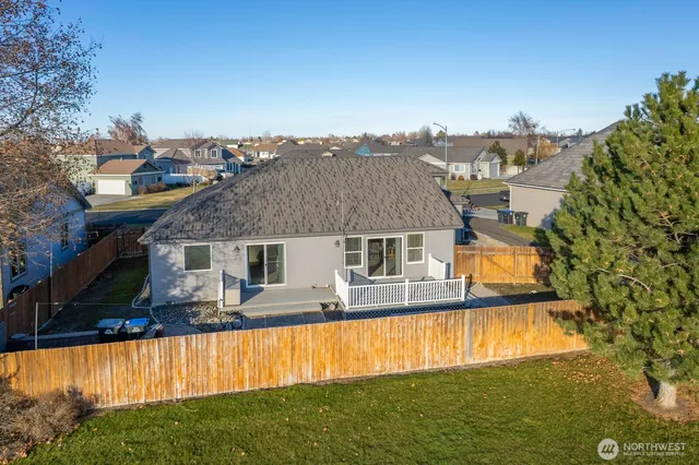 a view of a house with swimming pool