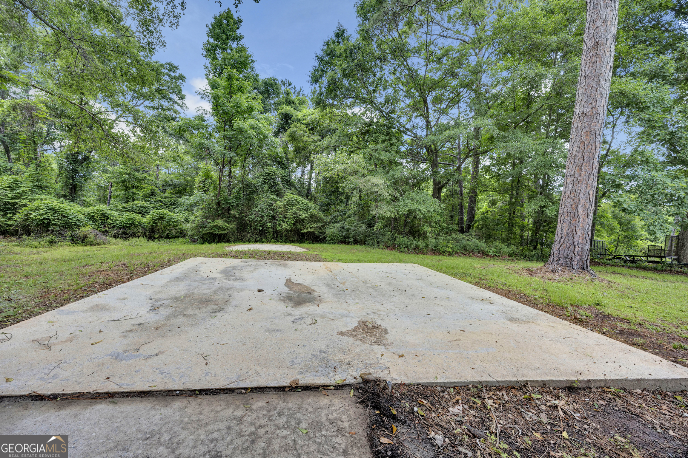 455 Cindy Street Jackson, GA 30233 - Photo 25 of 25 a view of a road with a yard