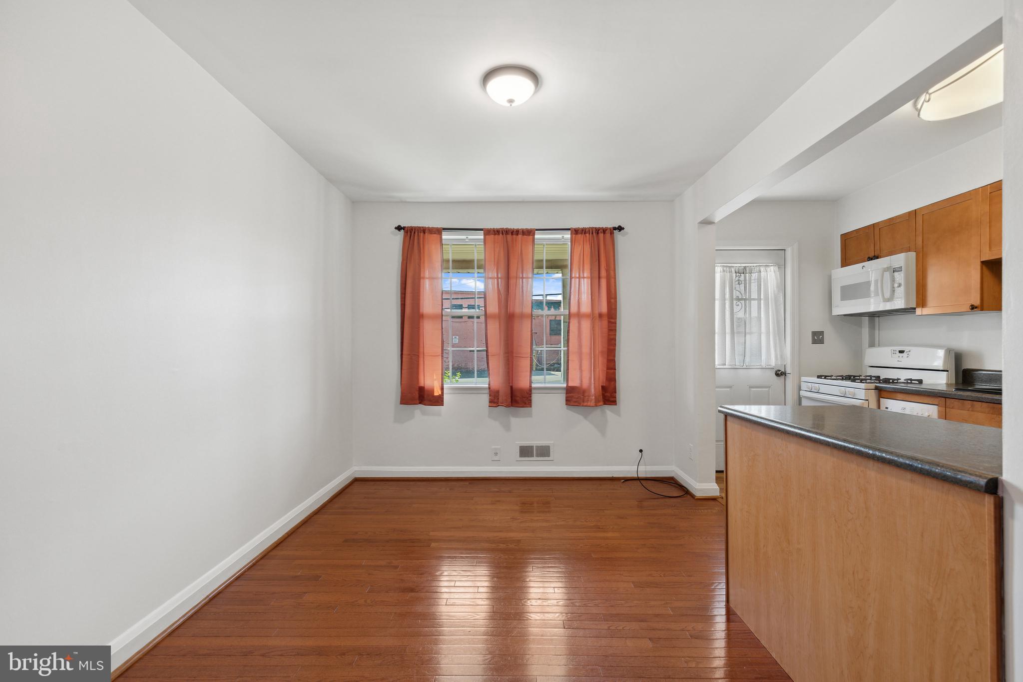 3418 Dunran Road Dundalk, MD 21222 - Photo 15 of 53 a view of a kitchen with a sink and dishwasher