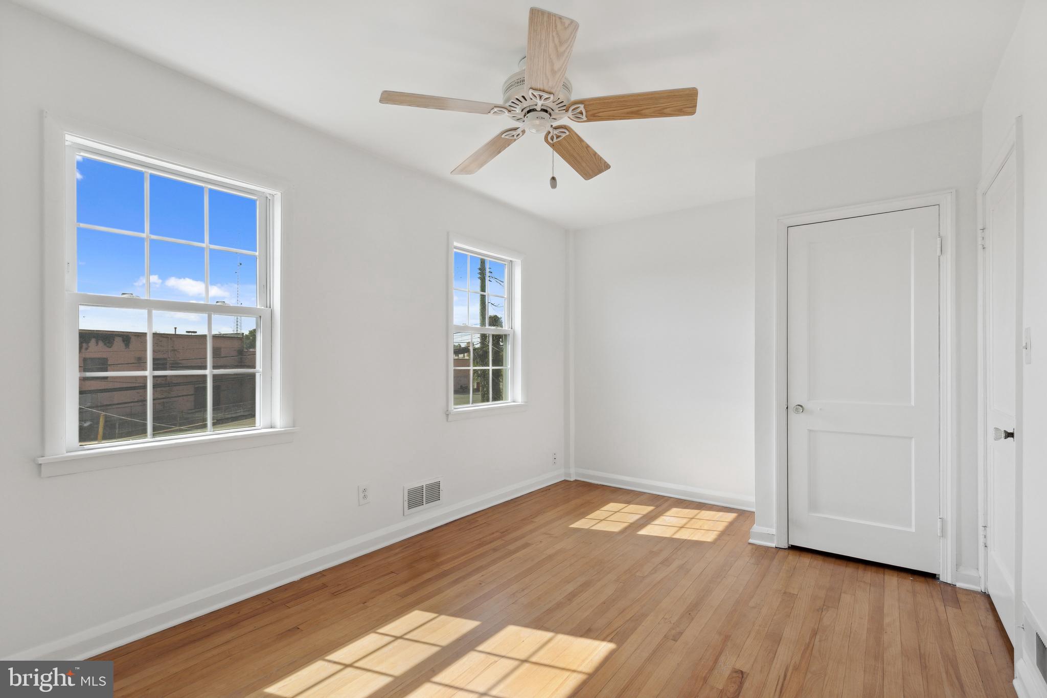 3418 Dunran Road Dundalk, MD 21222 - Photo 38 of 53 a view of empty room with wooden floor and fan