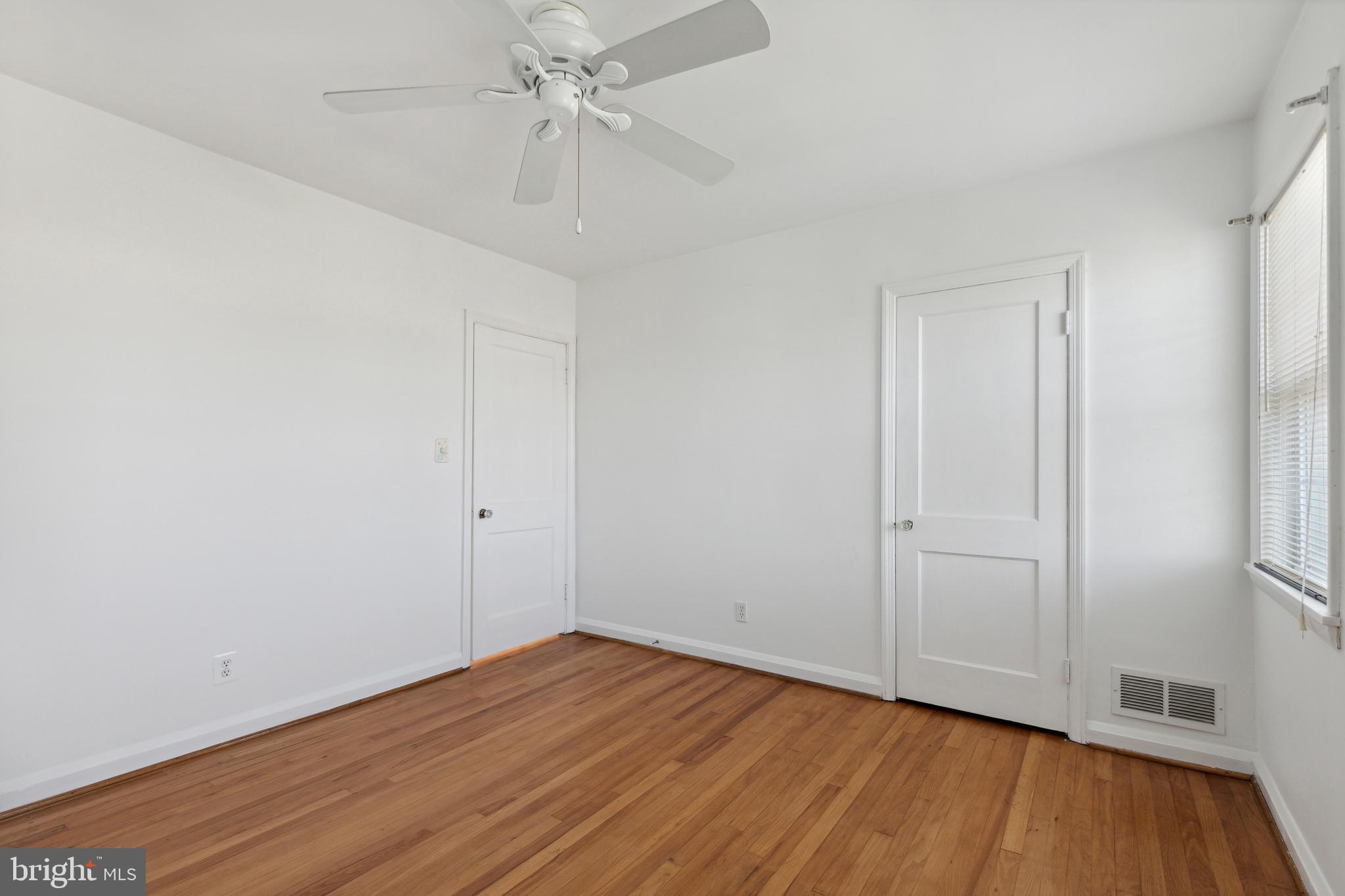 3418 Dunran Road Dundalk, MD 21222 - Photo 44 of 53 wooden floor in an empty room
