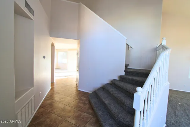 a view of a room with an entryway