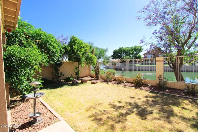a view of a backyard of a house