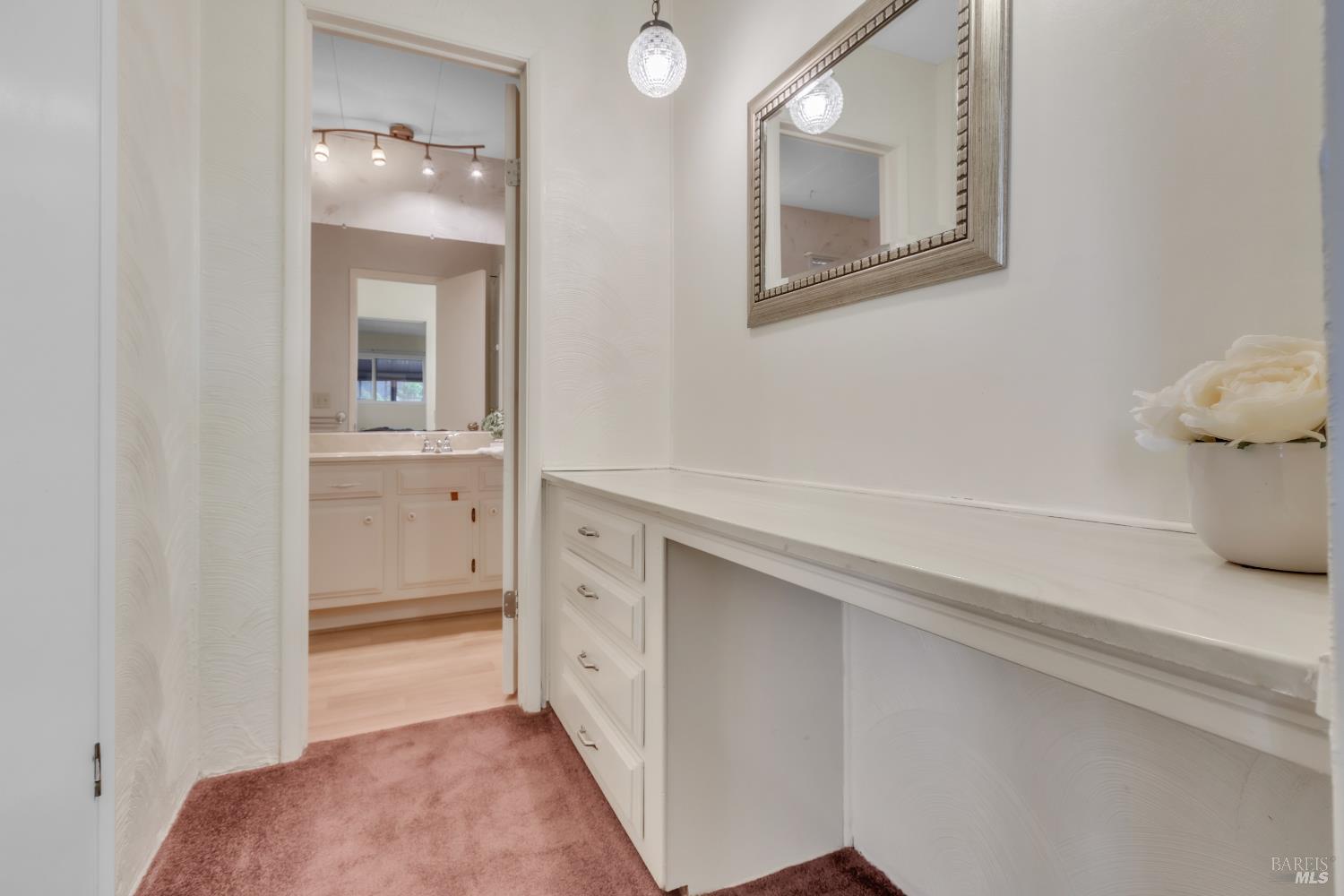 150 Silverado Trail, Unit 43 Napa, CA 94559 - Photo 13 of 29 a view of a hallway and a room with mirror