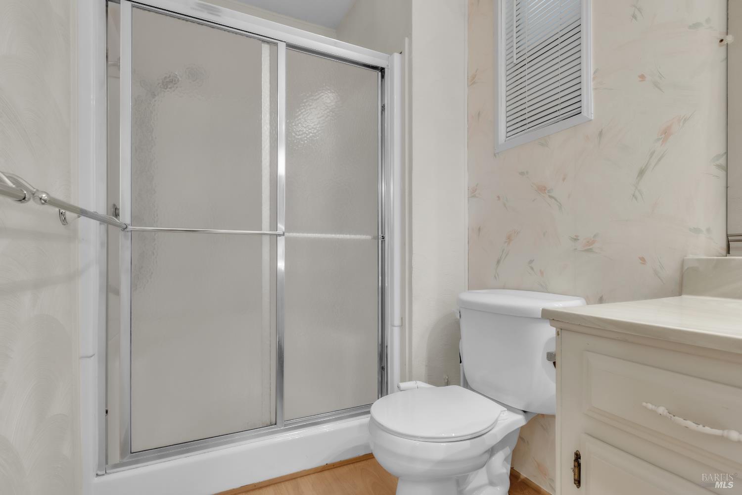 150 Silverado Trail, Unit 43 Napa, CA 94559 - Photo 15 of 29 a white toilet sitting next to a shower