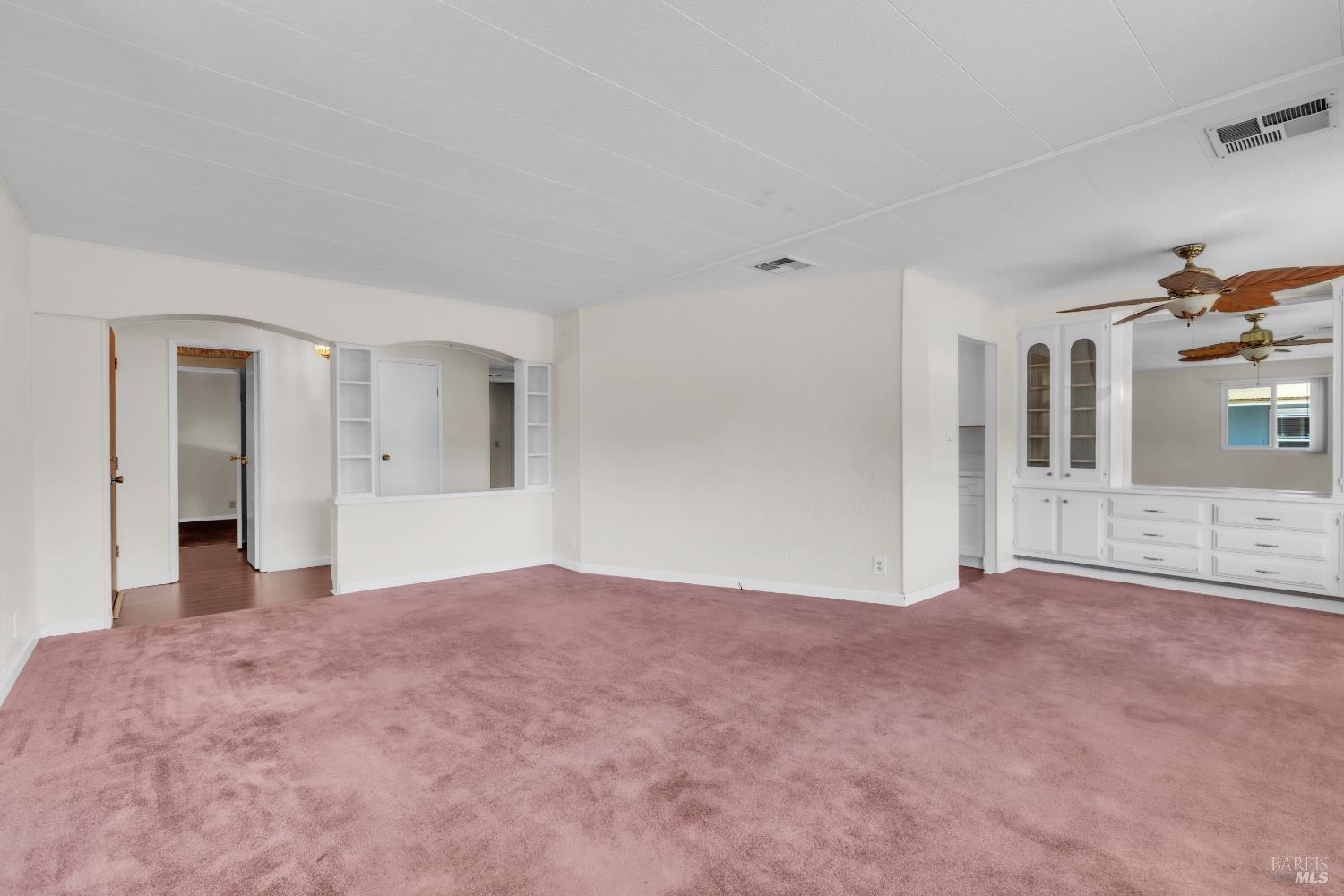 150 Silverado Trail, Unit 43 Napa, CA 94559 - Photo 16 of 29 a view of a big room with windows and cabinet